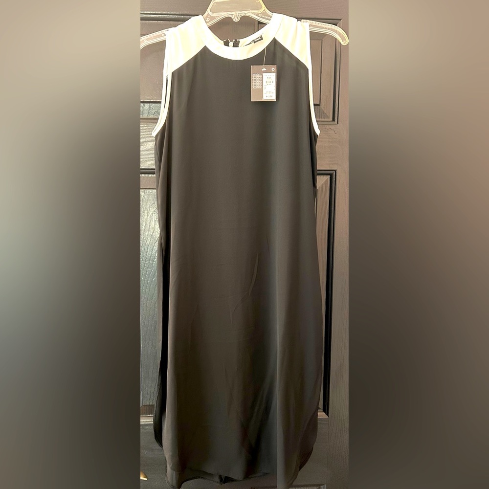 Atmosphere, women’s USA size 6, black knee length dress